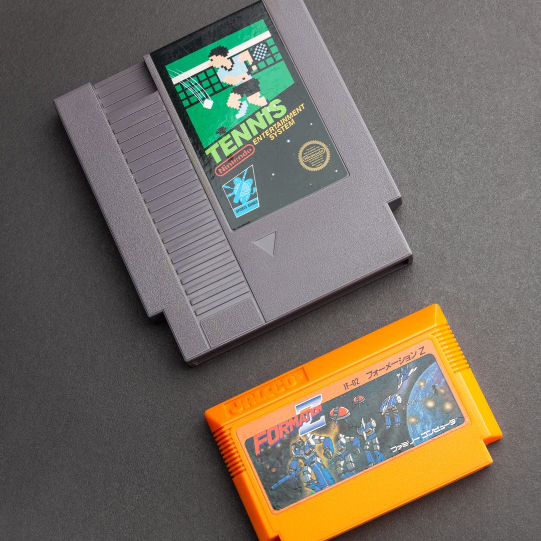row of retro NES and Famicom cartridges