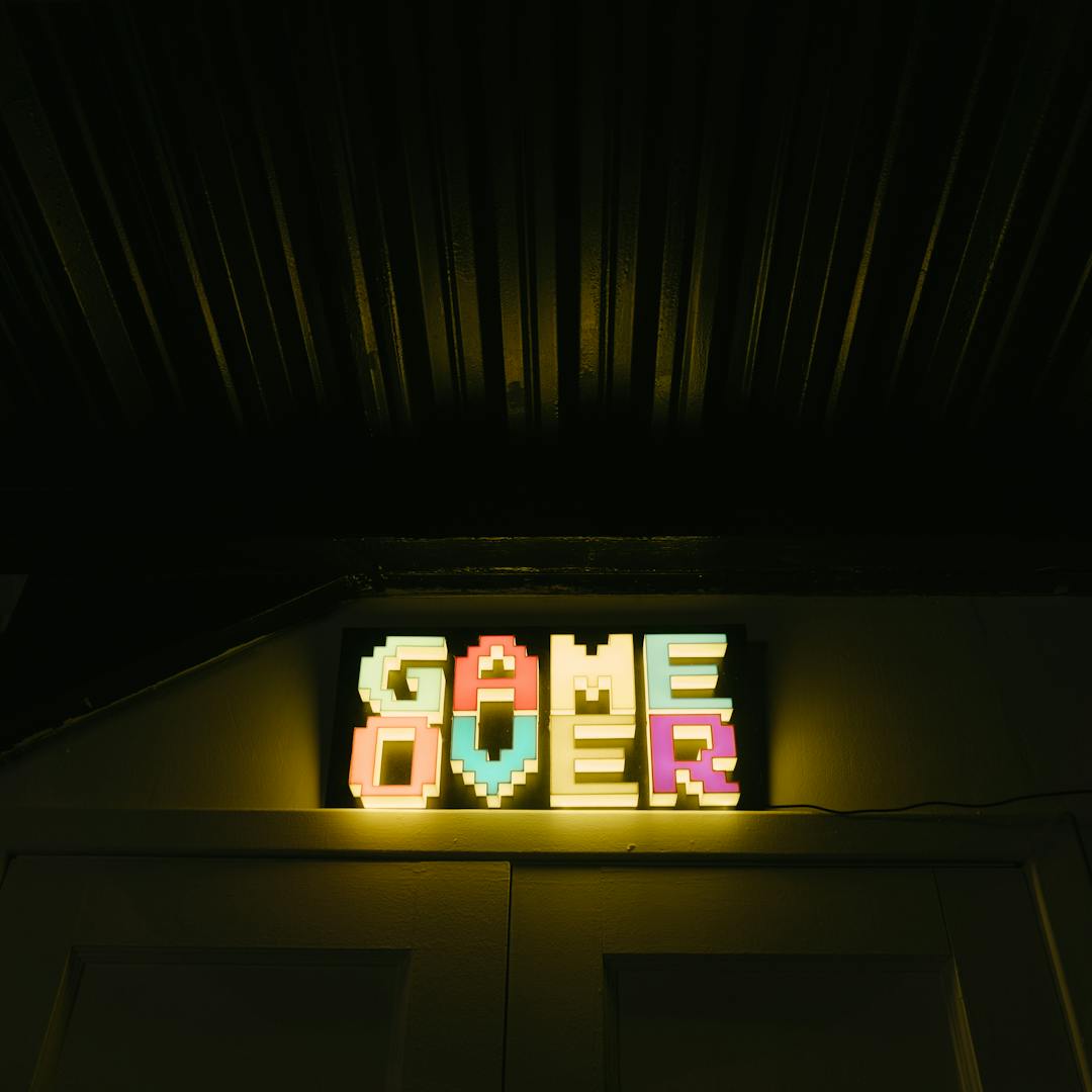neon Game Over sign in retro pixel style