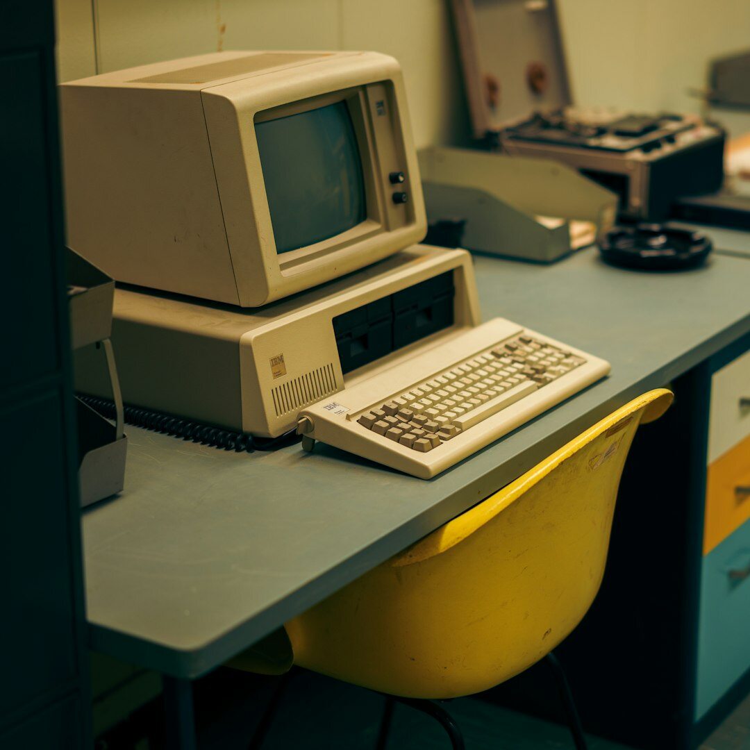 Collection of vintage game consoles on display