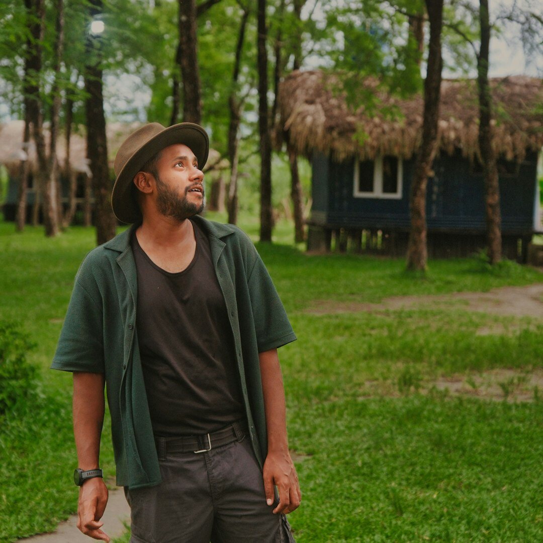 Bearded man smiling outdoors