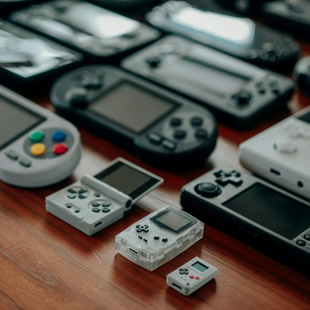collection of diverse retro handheld gaming consoles